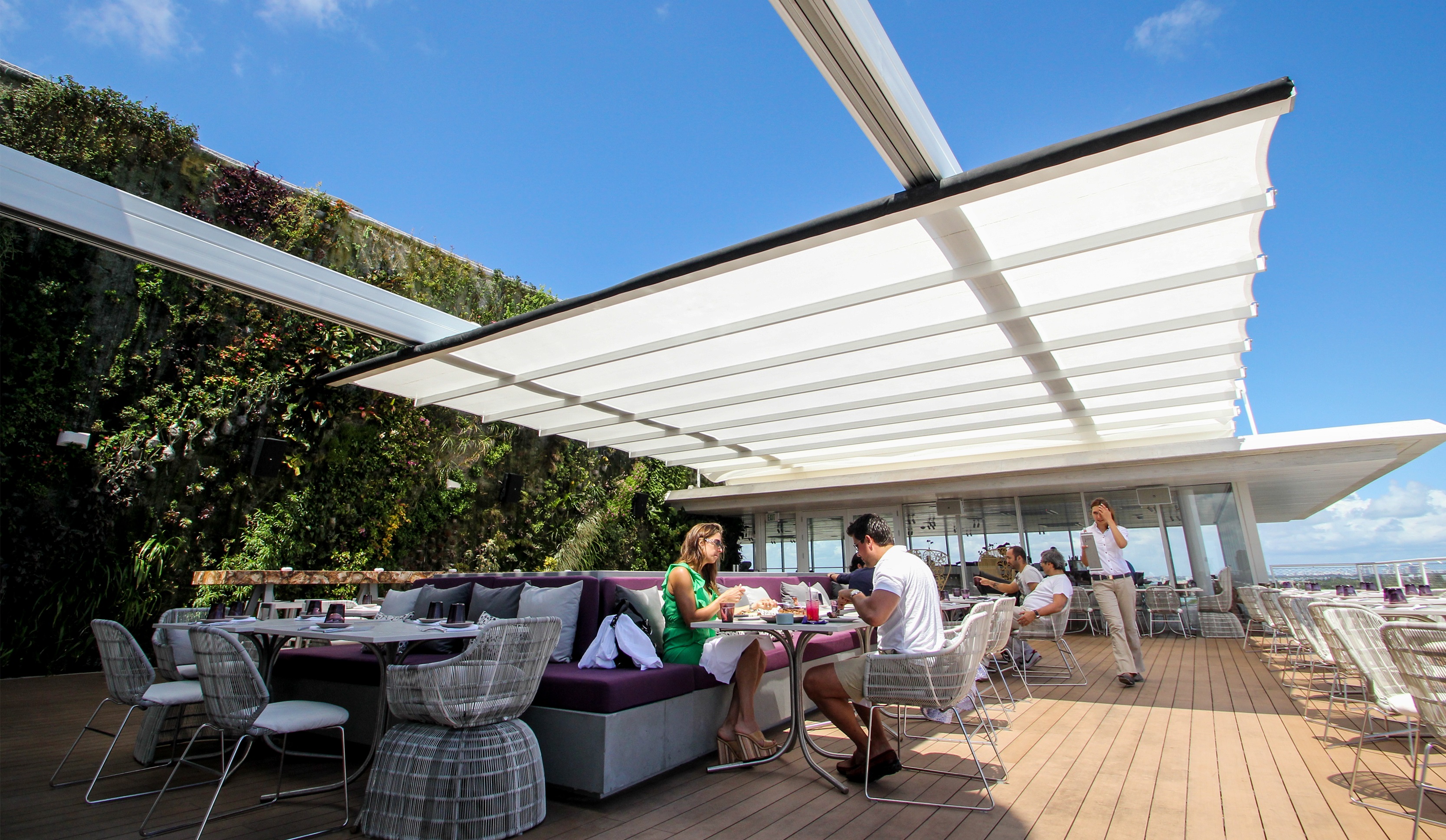 Juvia Restaurant En Fold Retractable Awning By Uni Systems Juvia Restaurant En Fold Retractable