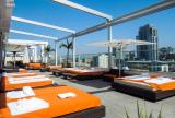 Retractable awning at Andaz Hotel | Roll-up curtains