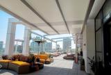 Retractable awning at Andaz Hotel | Roll-up curtains